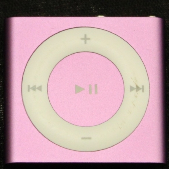 A purple iPod shuffle 4th generation. Wiped clean with 2GB of storage. Has not b - Picture 2 of 6